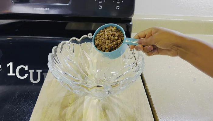 In a separate bowl, whisk together olive oil, lemon juice, salt, and pepper.