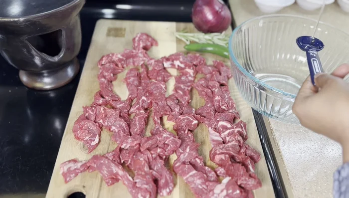 Add lamb (or other meat) to the heated oil.