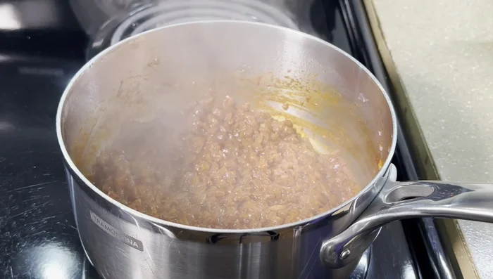 Stir gently to cook the eggs.