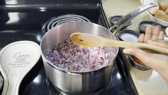 Prepare the onions and spices.