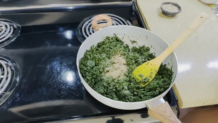 Cook until the collard greens are tender and the flavors have melded together. Stir frequently to prevent burning.