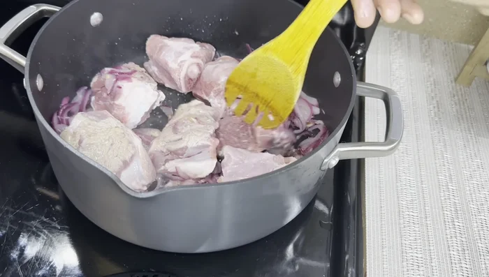 Add water to cover the meat and bring to a boil. Reduce heat and simmer until the meat is tender. (This step is implied and not explicitly stated in the transcript)