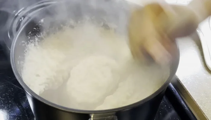 Place the pot on the stove over medium heat.