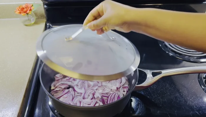Add water to cover the beef. Bring to a boil, then reduce heat to a simmer.
