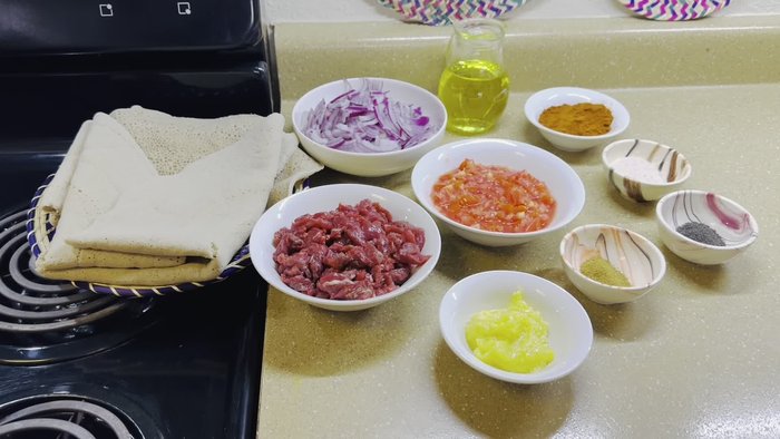 Prepare the aromatics: Chop onions, garlic and ginger.