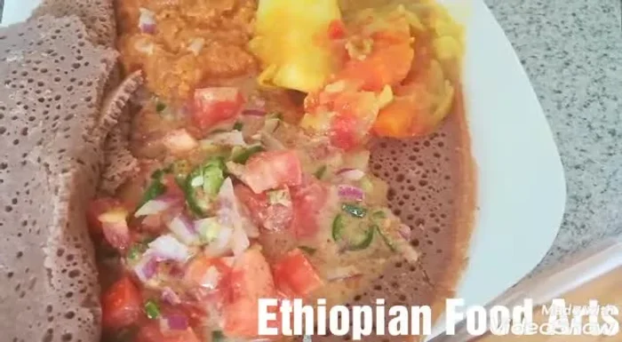 Heat a pan over medium heat. (This time is estimated based on the presence of music and sounds that might indicate this step).