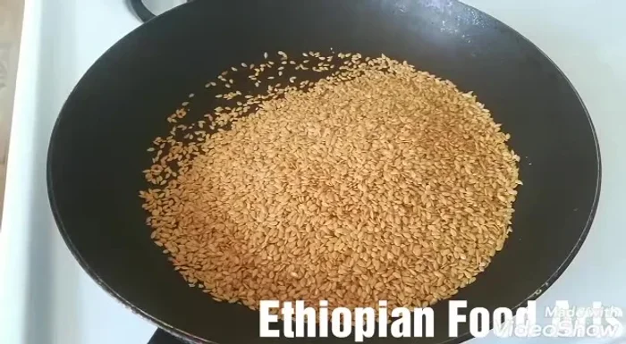 Roast the seeds until they are fragrant and slightly browned. (This information is inferred from the overall context of roasting seeds).