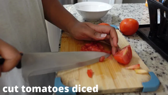 Dice the tomatoes.