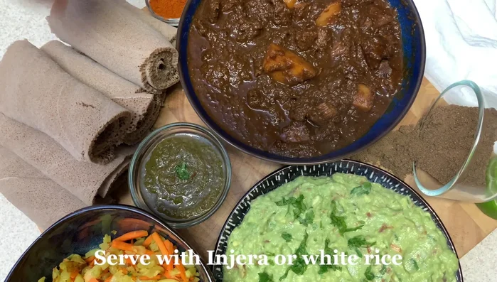 Add beef, potatoes, chicken broth, and more spices to the remaining sauce and simmer for approximately 1.5 hours until the meat and potatoes are tender. Do not cover with the Instant Pot lid; use a different lid to monitor the cooking process.