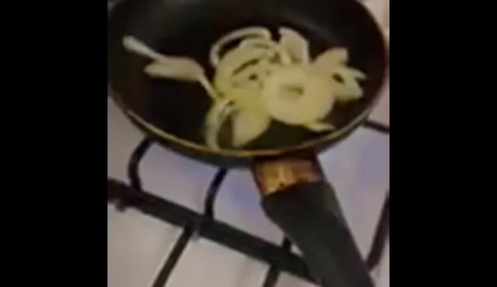 Sauté onions and peppers in hot oil until softened.