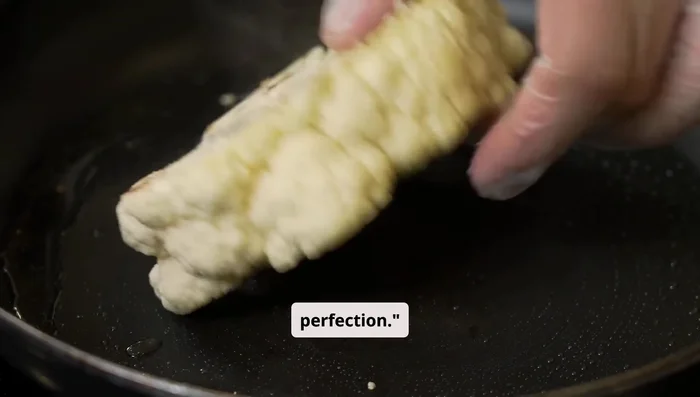 Fry the cauliflower: Heat oil in a deep frying pan over medium heat. Fry cauliflower florets in batches until golden brown and crispy (3-4 minutes per batch). Remove and place on paper towels to drain excess oil.