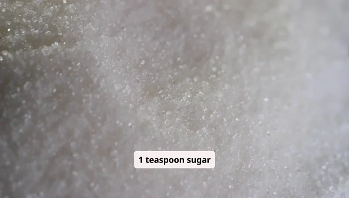 Combine flour, yeast, sugar, and salt in a large bowl. Add warm water and olive oil, mixing until a shaggy dough forms. Knead for 8-10 minutes until smooth and elastic.