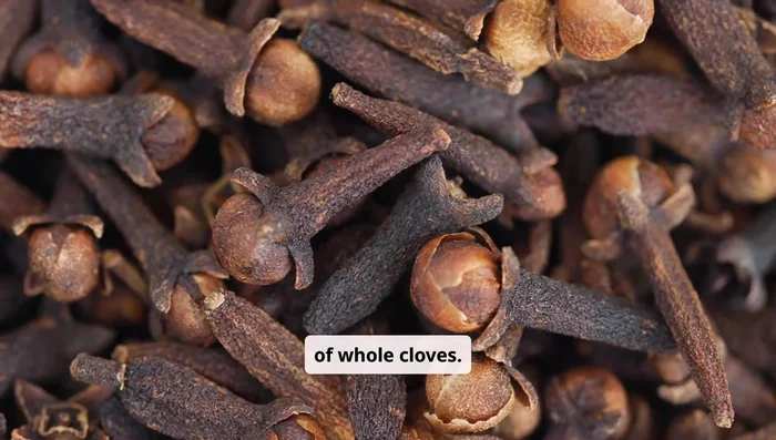 Prepare the cloves: Measure out one tablespoon of whole cloves.