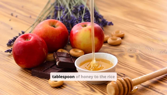 Add one tablespoon of honey to the rice water. Honey helps retain moisture in your hair.