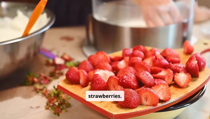 Gently fold in chopped strawberries.