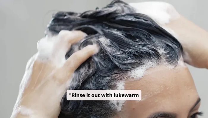 Rinse the mask out with lukewarm water and a gentle shampoo.