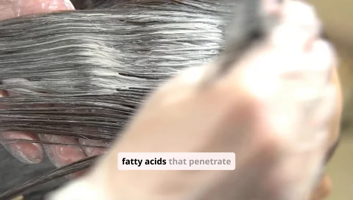Add one teaspoon of coconut oil. It's rich in fatty acids that penetrate the hair shaft and lock in hydration.