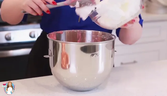 Gently fold in the egg whites in thirds, ensuring a light batter.