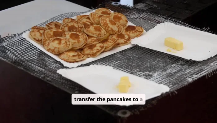 Transfer pancakes to a plate. Dust with powdered sugar, add fresh berries, and drizzle with maple syrup or your favorite toppings.