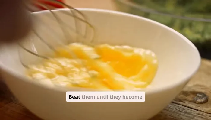 Beat chilled egg whites until frothy and opaque. Gradually add sugar, beating until stiff peaks form. The meringue should be glossy and hold its shape.