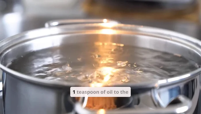Bring 4 cups of water to a boil. Add 1 teaspoon salt and 1 teaspoon oil. Add 1 cup elbow macaroni, stir occasionally, and cook until fork tender (5-6 minutes). Drain and rinse with cold water; reserve 1/2 cup pasta water.