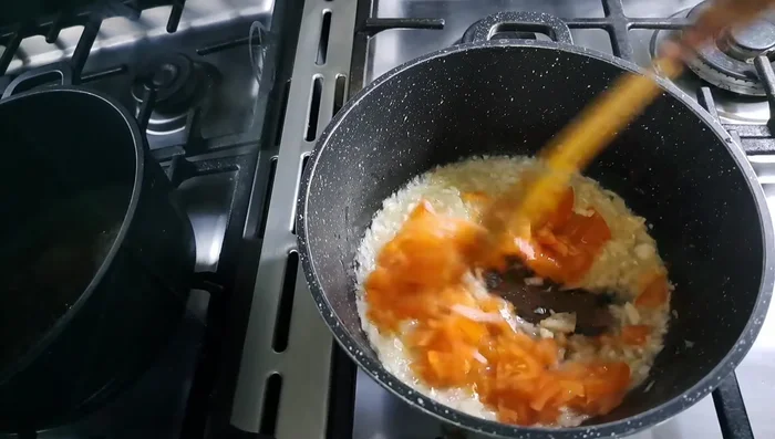 Add tomatoes and fry.