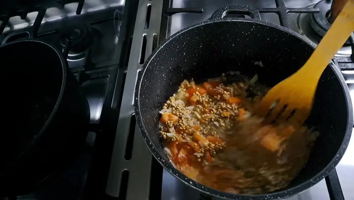 Add cooked lentils and fry.