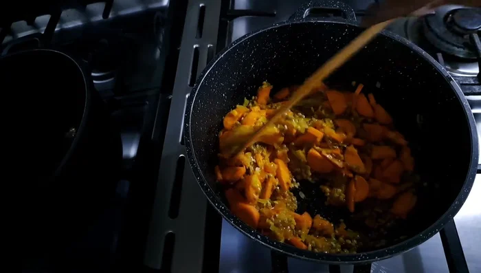Add carrots and boil.