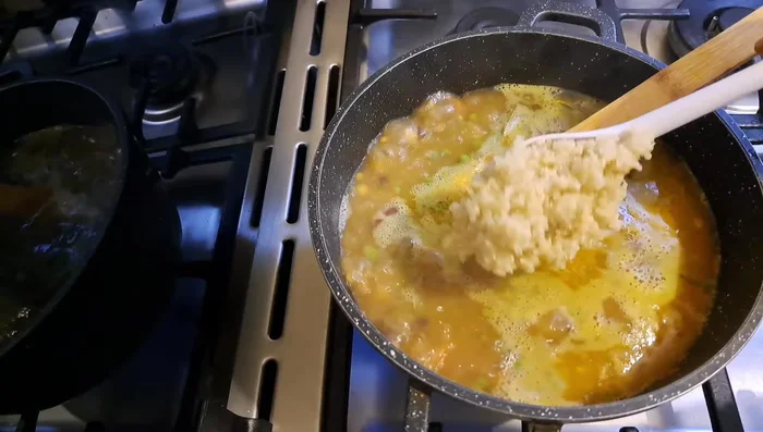 Add cooked quinoa and water. Boil.