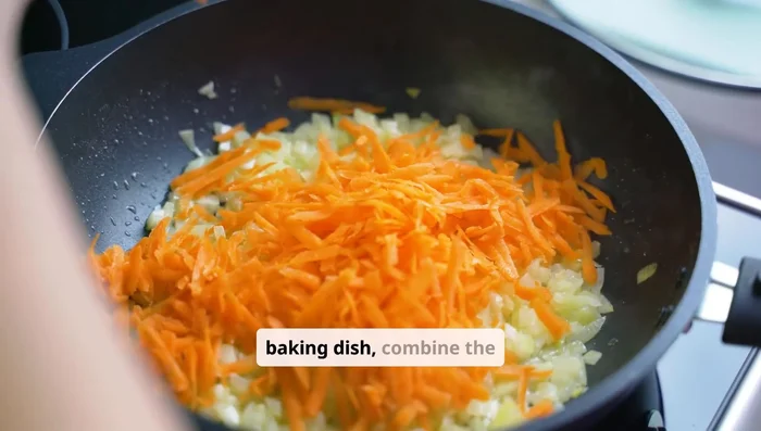 In a roasting pan, combine chopped onion, carrots, and potatoes. Drizzle with remaining olive oil; season with Italian seasoning, salt, and pepper. Toss to coat.