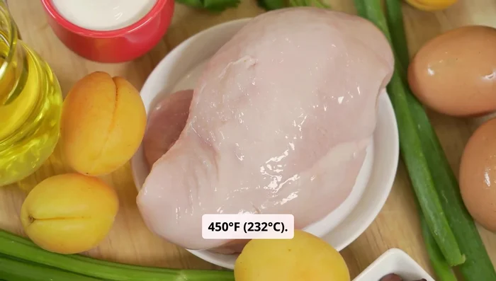 Preheat oven to 450°F (232°C). Pat chicken dry with paper towels; remove giblets. Rub with 2 tablespoons olive oil; season with salt, pepper, and herbs. Add lemon wedges inside (optional).