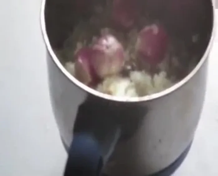 In a pot, combine the ground mixture and grated coconut.