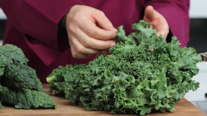 If using curly kale, remove the leaves from the tough stems. You can tear the leaves with your hands for faster prep.
