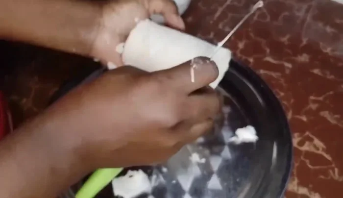 Wash the cassava and slice it into smaller chunks for even cooking.