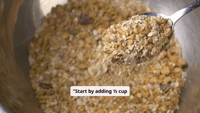 Add half a cup of rolled oats to a saucepan.