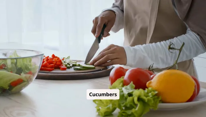 Slice three to four ripe tomatoes into big wedges.