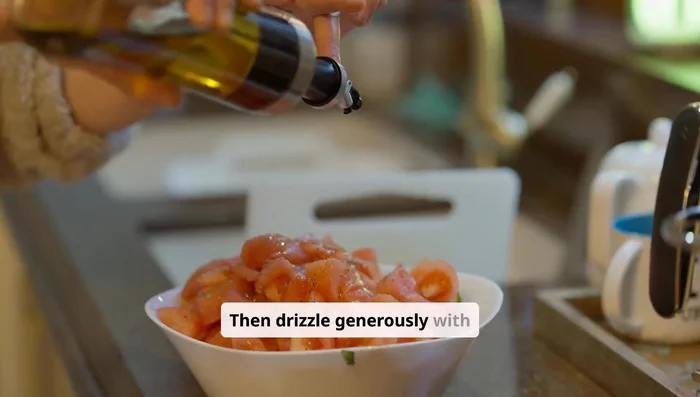 Drizzle generously with 3-4 tablespoons of extra virgin olive oil.