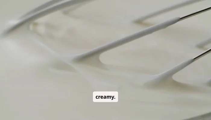 Whisk the mixture until it becomes creamy.