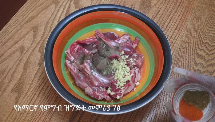 Add olive oil to season the lamb chops.